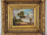 a painting of a landscape with trees in a gold frame