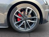 a close up view of a car ' s wheel and tire