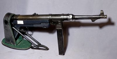 a toy gun that is sitting on top of a table