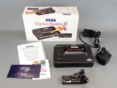 a box with a game on it and a charger on the table