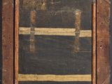a close up of a wooden frame with a painting of a cross on it