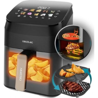 a close up of an air fryer with food inside of it