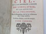 a book with a picture of a coat of arms on it
