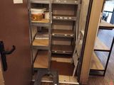 a metal shelf that has some shelves on it