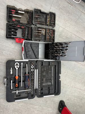 a lot of tools that are laying out on the floor
