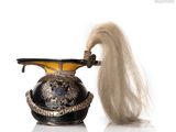 un sèche-cheveux sur lequel se trouve un long cheveu blanc