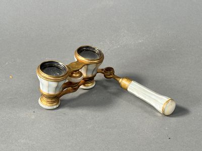 a pair of binoculars that are sitting on a table