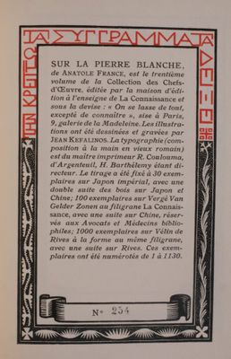 a black and white book with red writing on it