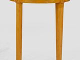 a close up of a wooden table with a black top