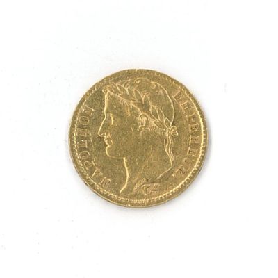 l'image d'une pièce d'or sur laquelle figure le visage d'une femme