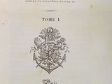 the front cover of a book with a picture of a coat of arms on it