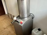 a machine that is sitting next to a wall