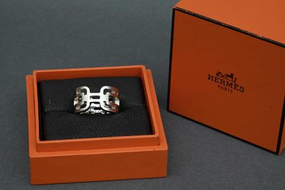 a ring that is in a box on a table