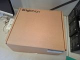 a box that is sitting on a desk next to a computer