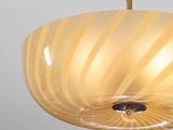 a light that is hanging from the ceiling in the room