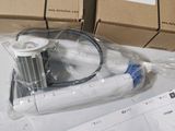 a box of boxes and a hose on a table
