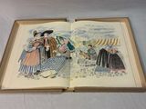 an open book with a picture of a woman and a man