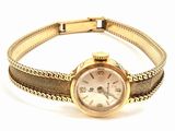 an image of a lady ' s wrist watch with a chain around it