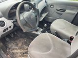 a car with a steering wheel and a dashboard