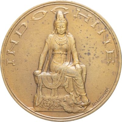 an image of a gold coin with a statue of a person sitting on a chair