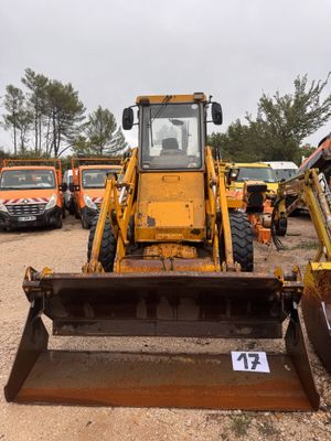 a bulldozer that is sitting in the dirt
