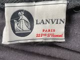 the label of a lanvin paris suit is shown on the back of the shirt