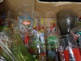 a box full of sodas and soda glasses