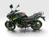 the motorcycle is parked on a white surface with a white background