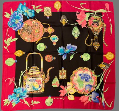 an image of a scarf with a variety of items on it