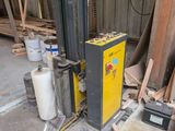 a picture of a fork lifter in a warehouse