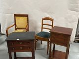 three chairs and a table in a room with a white backdrop