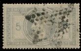 a stamp with a picture of a woman and flowers on it