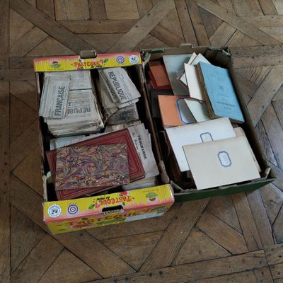a box full of books sitting on the floor