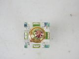 a small square glass object with a gold ring on it