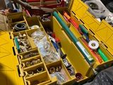 a man that is holding a tool box full of tools