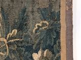 a close up of a piece of cloth with a flower design