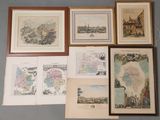 de nombreuses cartes encadrées représentant différents pays accrochées au mur