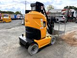 an image of a forklift parked in a parking lot