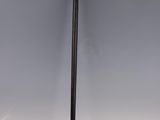 an old cane with a wooden handle on a white background