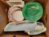 a box full of plates and bowls in it