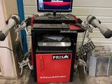 a picture of a machine with a monitor on top of it