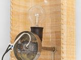 a light that is attached to a wooden box