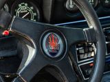 a close up of a steering wheel and dashboard of a car