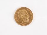 an image of a gold coin on a white surface