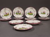 six plates with different designs and designs on them on a gray surface