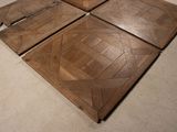 four pieces of wood that are on the floor