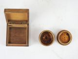 a small wooden box and two small wooden bowls