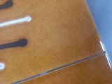 a close up of a knife and fork on a table