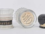 five different types of salt and pepper shakers in a row