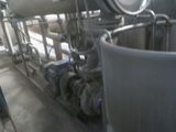 pipes and valves in a large room with a lot of pipes